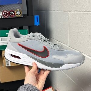 Nike Gray Sneakers with Red Swoosh